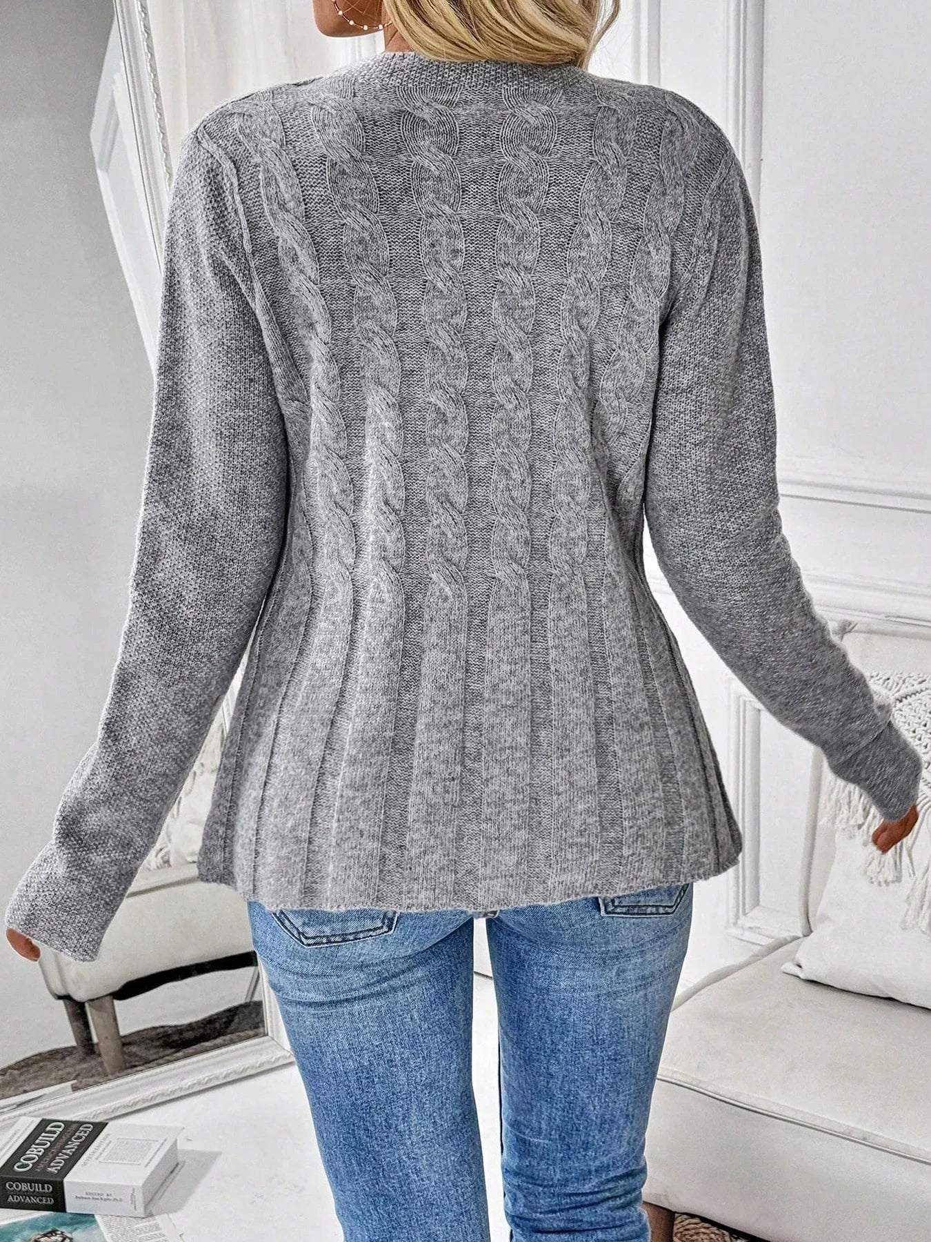 Women's simple solid color long sleeved cardigan knitted sweater for autumn and winter