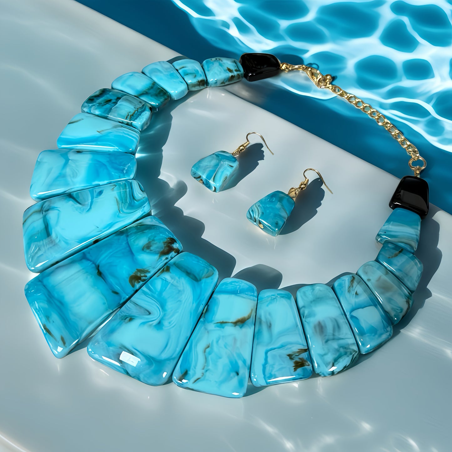 Elegant Blue Resin Jewelry Set with Golden Accents