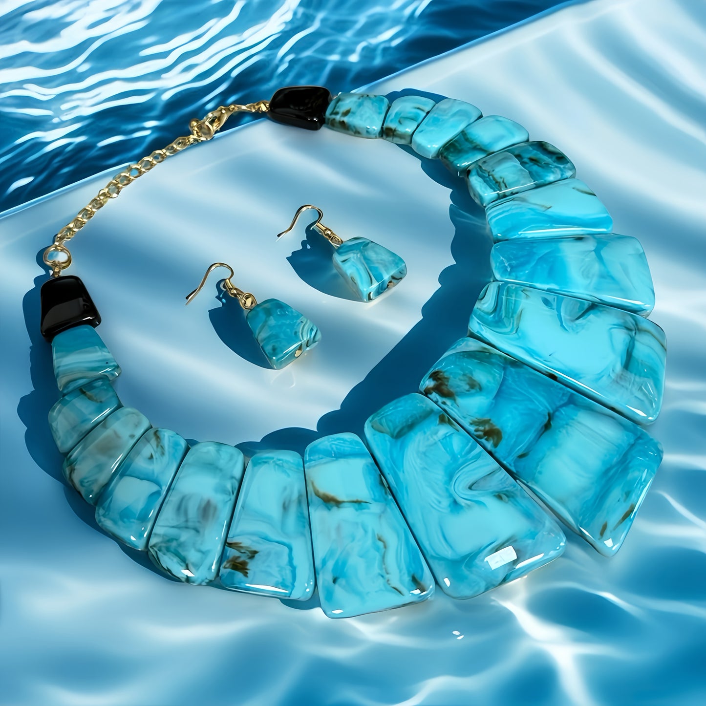Elegant Blue Resin Jewelry Set with Golden Accents